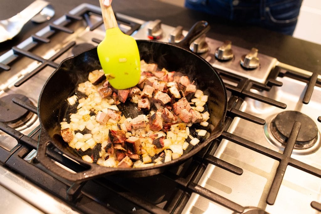 Sweet potato and brisket hash with yellowbird sauc