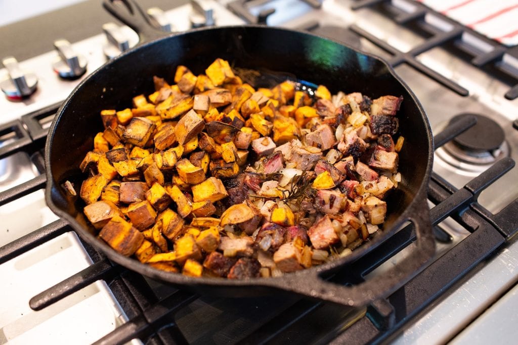 Sweet potato and brisket hash with yellowbird sauce