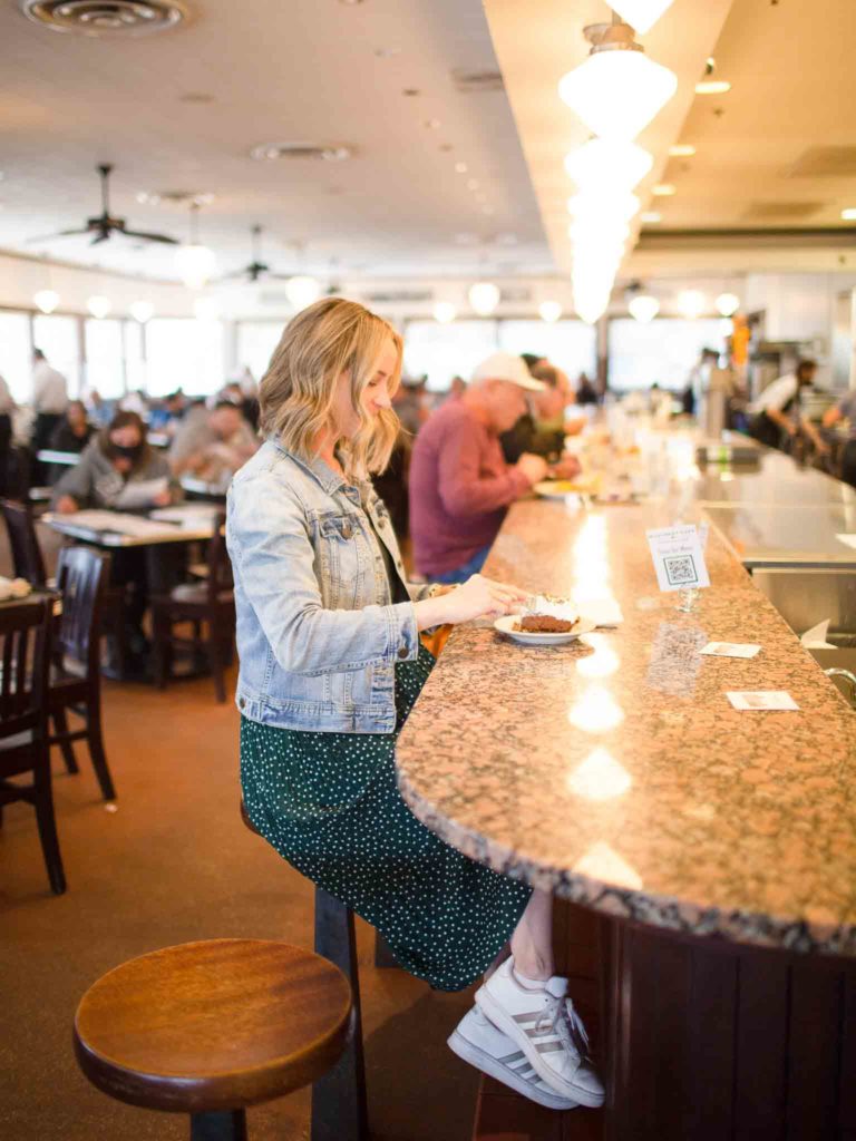 Girl at bar in Monument Cafe