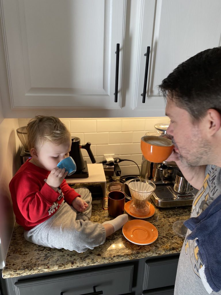 Nate and Milo drinking coffee