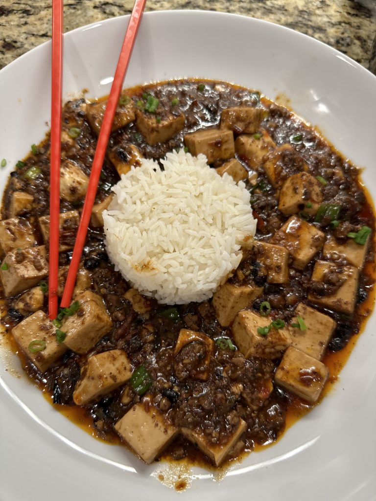 Nate cooking mapo tofu